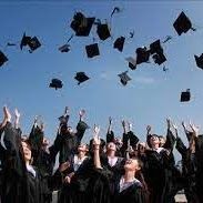 College graduate students throwing up their caps